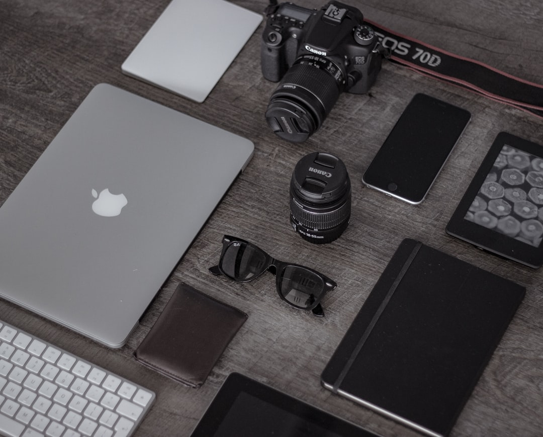 A neatly organized workspace featuring cables, chargers, and tech accessories stored in an orderly fashion.