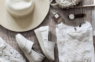 A collection of versatile clothing items and layers neatly packed in a suitcase, showcasing practicality for travel.