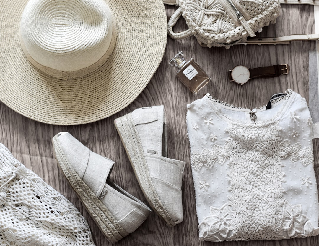 A collection of versatile clothing items and layers neatly packed in a suitcase, showcasing practicality for travel.