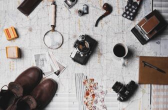 A well-organized travel kit with essential items for long trips, including packing cubes, a travel pillow, and a water bottle.