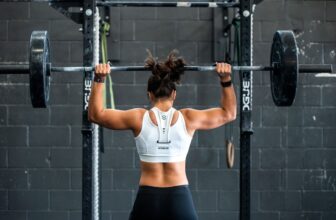 A person stretching after a workout, focusing on recovery and relaxation.